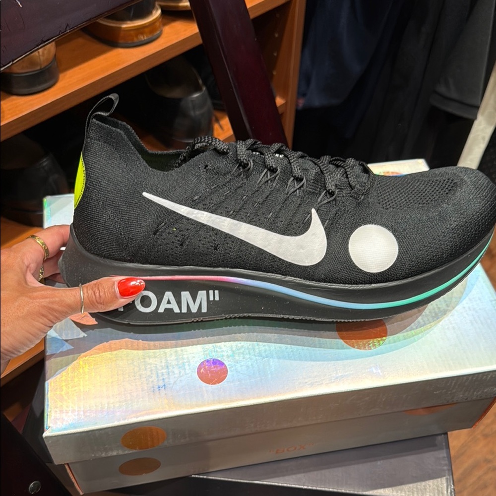 Black Nike Running Shoes with White Swoosh
